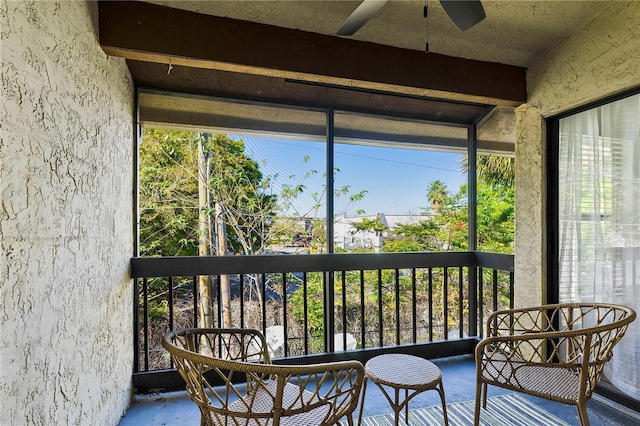 sunroom / solarium with ceiling fan