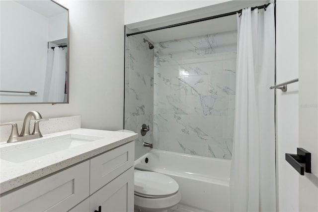 full bathroom with vanity, toilet, and shower / tub combo