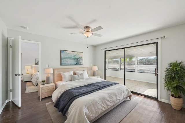 bedroom featuring a ceiling fan, access to outside, wood finished floors, and baseboards