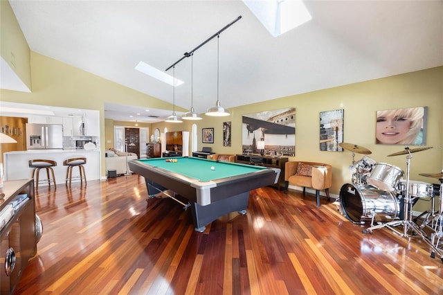 rec room featuring billiards, a skylight, dark wood-style flooring, and high vaulted ceiling