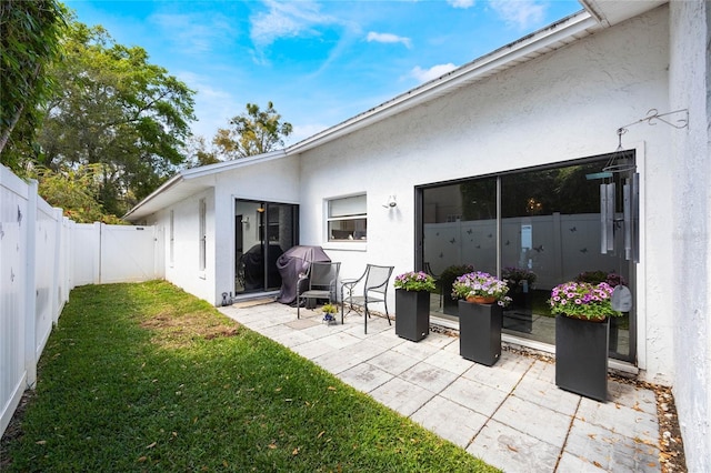 exterior space featuring a fenced backyard