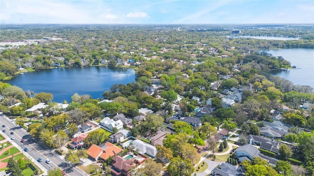 aerial view with a residential view and a water view