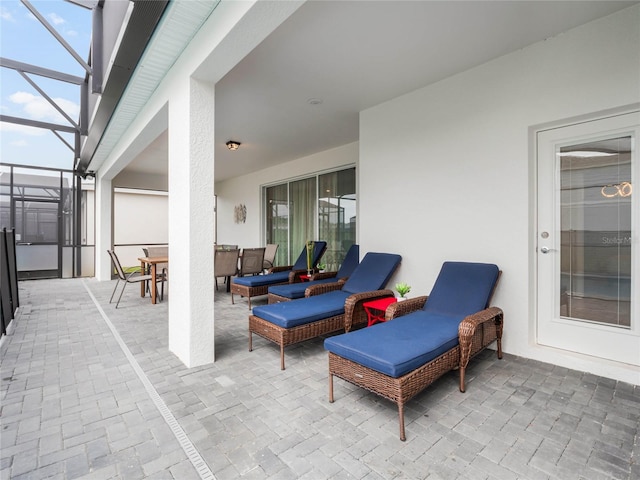 view of patio / terrace with an outdoor hangout area and a lanai