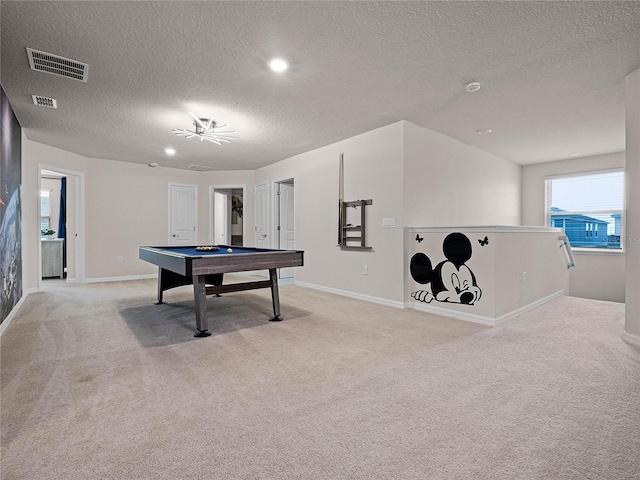 playroom with visible vents, baseboards, pool table, a textured ceiling, and light colored carpet