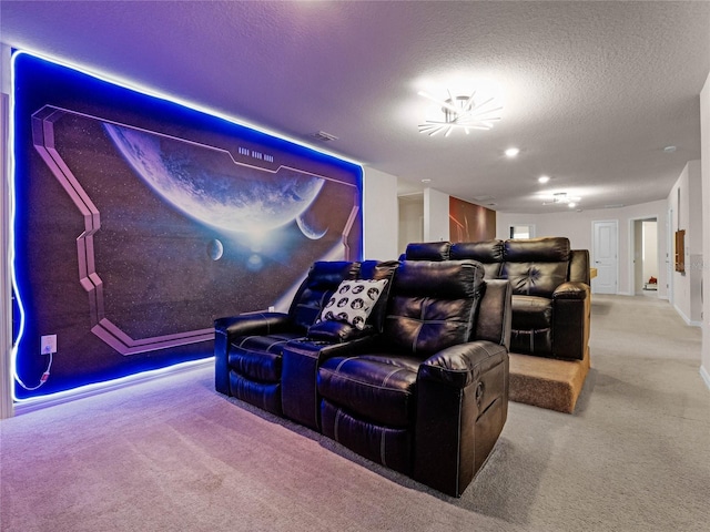 carpeted cinema featuring visible vents and a textured ceiling