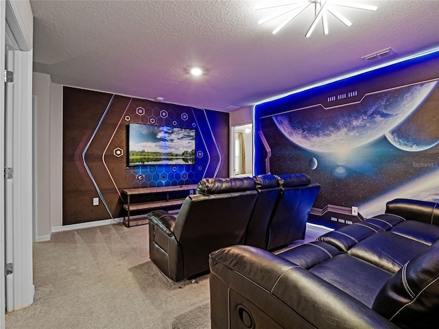 home theater featuring baseboards, carpet, visible vents, and a textured ceiling