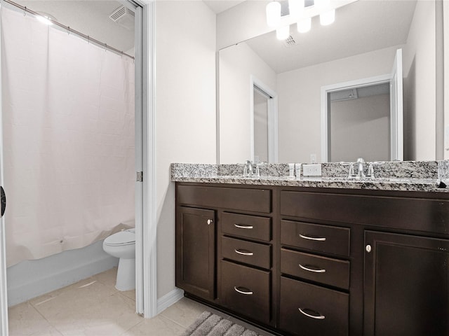 full bathroom featuring double vanity, visible vents, toilet, and a sink