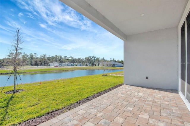 view of patio / terrace with a water view