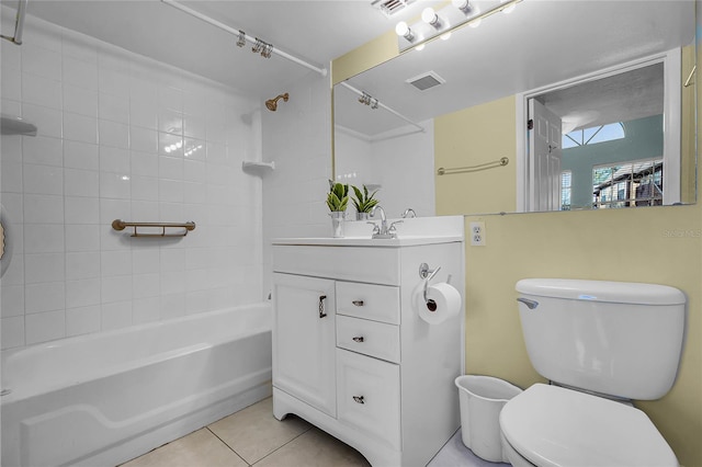 bathroom featuring tile patterned floors, visible vents, toilet, and  shower combination