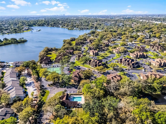 birds eye view of property with a residential view and a water view