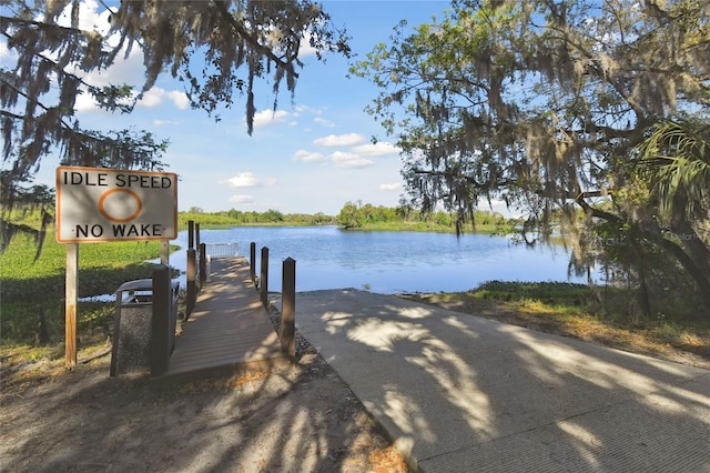 view of dock with a water view