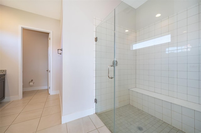 2400 Symphony Cir, Saint Cloud, FL 34771 - full bathroom featuring a shower stall, baseboards, and tile patterned flooring