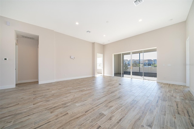 2400 Symphony Cir, Saint Cloud, FL 34771 - empty room featuring recessed lighting, visible vents, light wood-type flooring, and baseboards