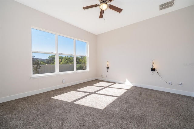 2400 Symphony Cir, Saint Cloud, FL 34771 - carpeted empty room with visible vents, baseboards, and a ceiling fan