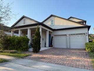 view of front of property with an attached garage and driveway