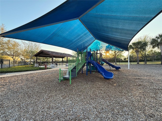 community jungle gym with fence