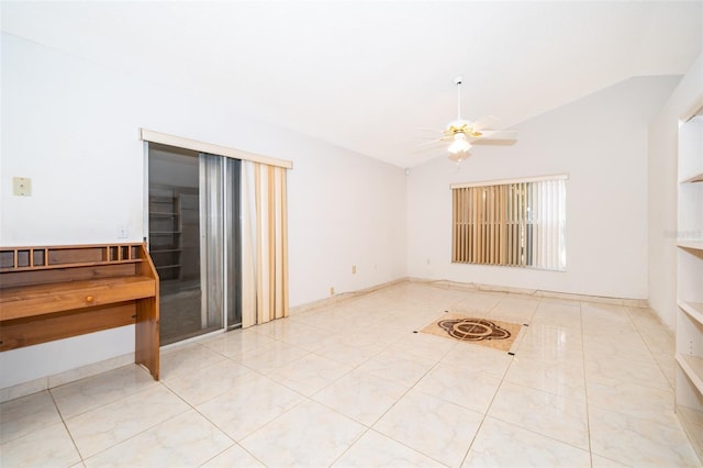 unfurnished room featuring lofted ceiling, tile patterned floors, and ceiling fan