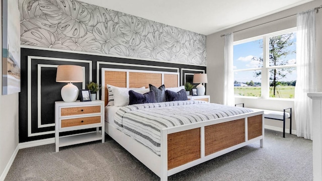 bedroom featuring baseboards, carpet flooring, and wallpapered walls