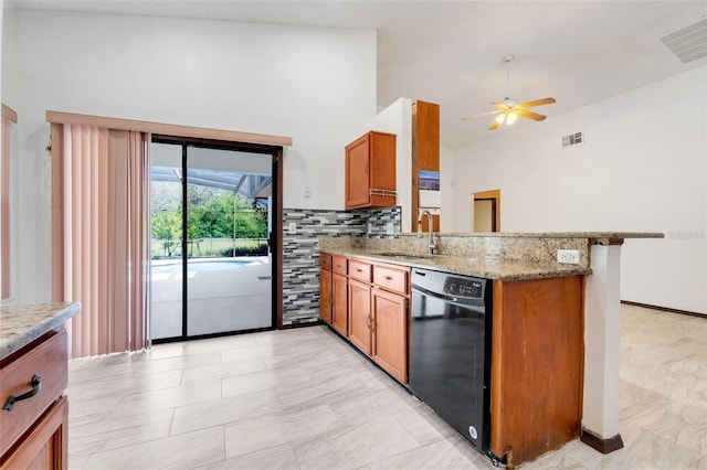 kitchen with visible vents, brown cabinets, a peninsula, dishwasher, and ceiling fan