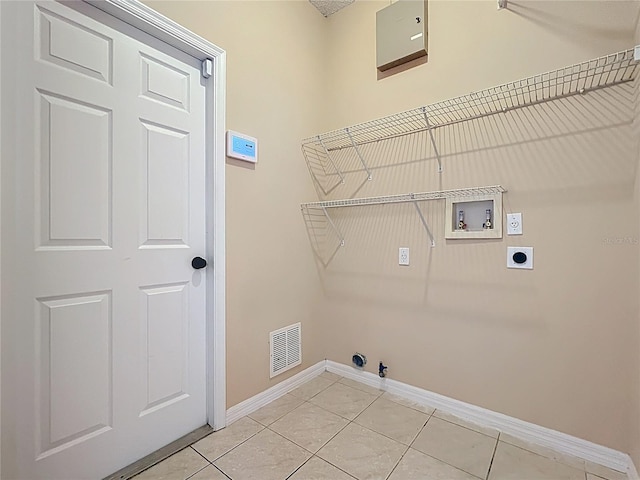 clothes washing area with visible vents, gas dryer hookup, laundry area, hookup for a washing machine, and electric dryer hookup