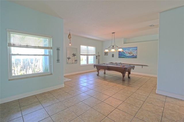 playroom featuring light tile patterned floors, visible vents, baseboards, and pool table