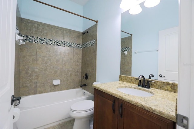 bathroom with tile patterned flooring, bathing tub / shower combination, vanity, and toilet