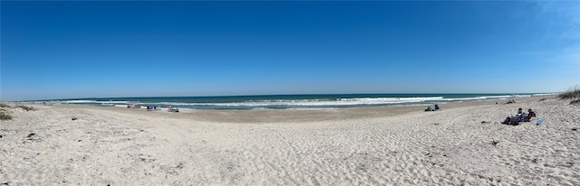 view of water feature with a view of the beach