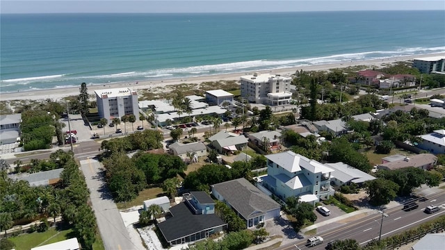 aerial view with a view of the beach and a water view