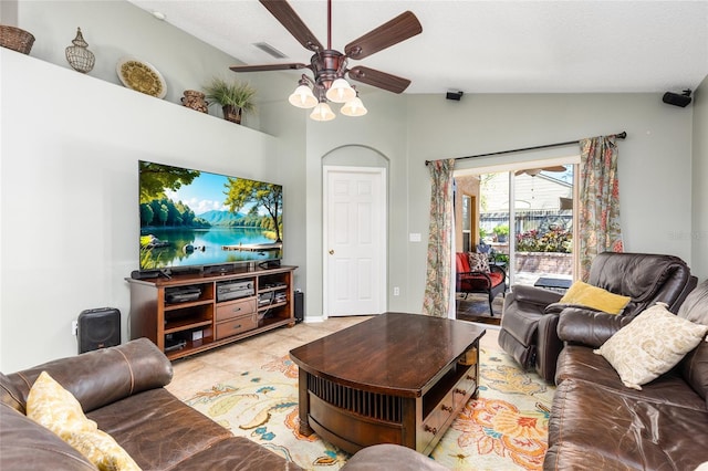 living area featuring light tile patterned floors, visible vents, lofted ceiling, and ceiling fan