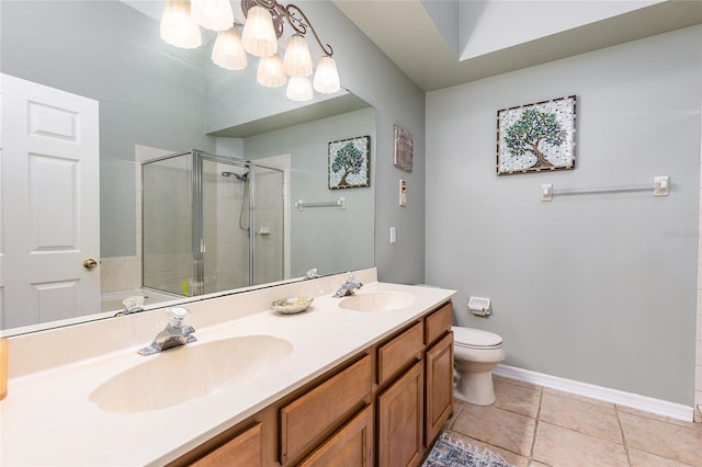 full bathroom with a sink, baseboards, toilet, and a stall shower