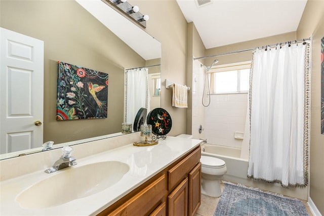 bathroom featuring tile patterned floors, visible vents, shower / tub combo with curtain, toilet, and vanity