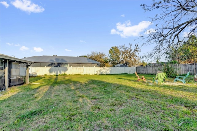 view of yard featuring a fenced backyard