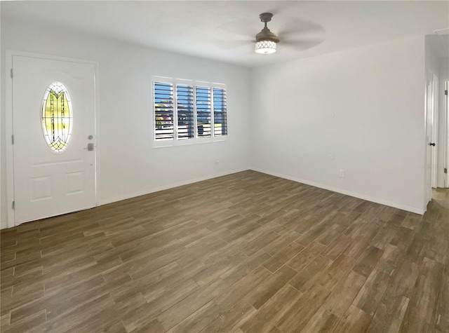 entryway featuring wood finished floors, baseboards, and ceiling fan