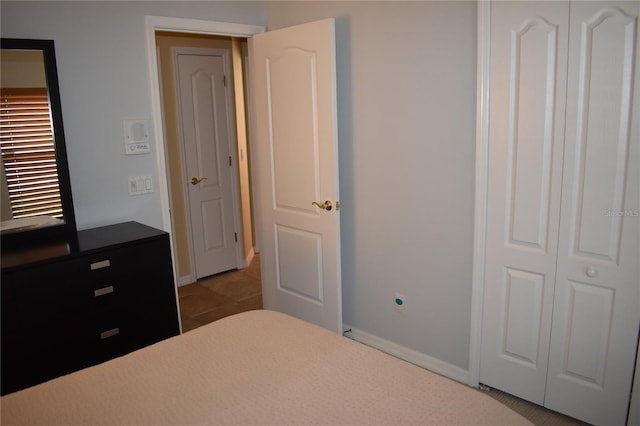 unfurnished bedroom with baseboards