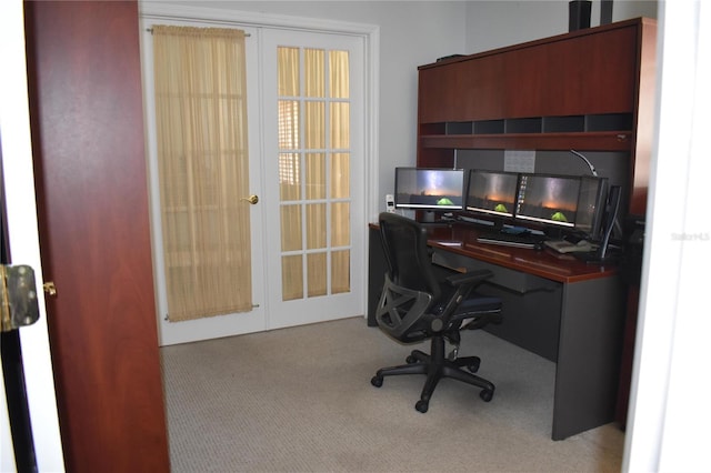 carpeted office with french doors