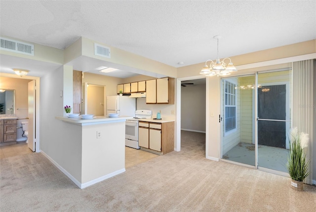 kitchen featuring white appliances, a notable chandelier, light colored carpet, and visible vents