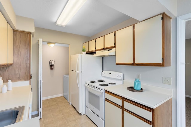 kitchen with under cabinet range hood, a sink, white electric stove, light countertops, and baseboards