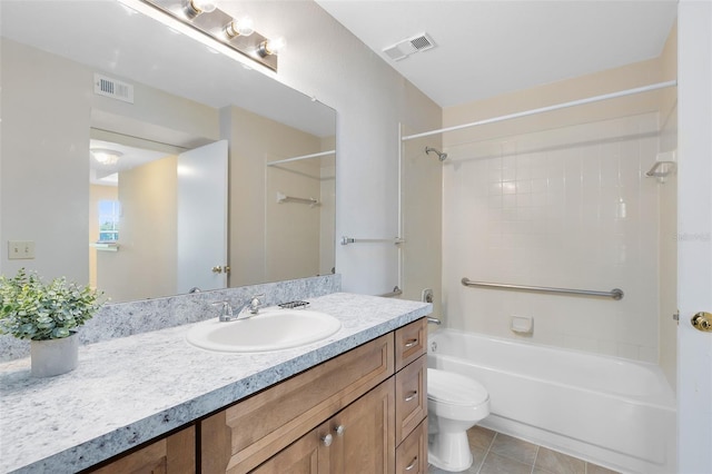 bathroom with vanity, visible vents, shower / tub combination, toilet, and tile patterned floors