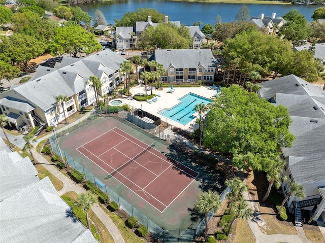 aerial view featuring a residential view and a water view