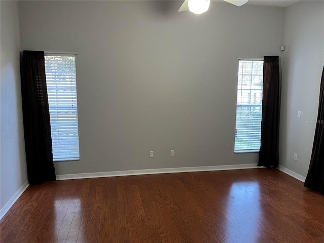 unfurnished room featuring wood finished floors, ceiling fan, and plenty of natural light