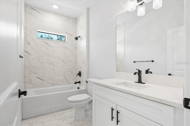 full bathroom featuring vanity, toilet, marble finish floor, and shower / bath combination