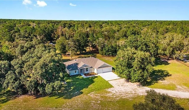 drone / aerial view with a forest view