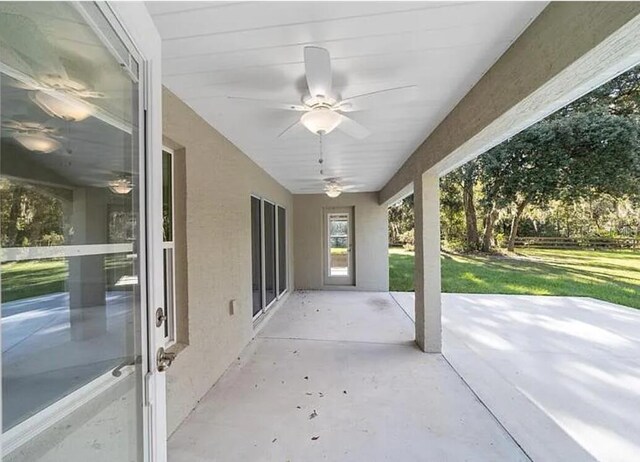 view of patio / terrace with a ceiling fan