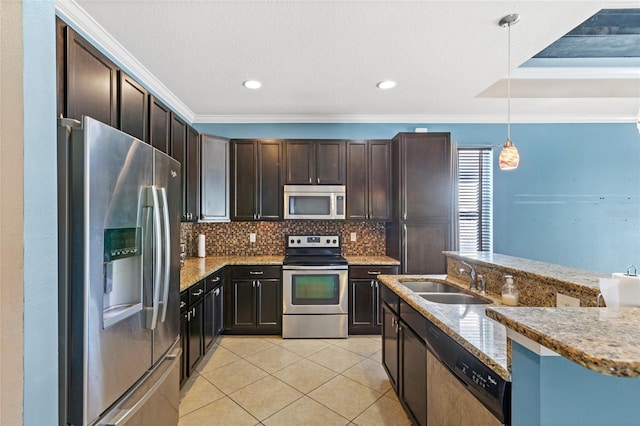 kitchen with light tile patterned floors, a sink, appliances with stainless steel finishes, crown molding, and backsplash