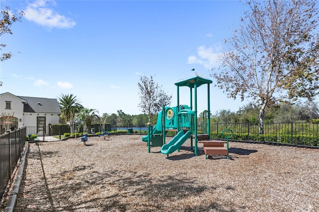 community jungle gym featuring fence