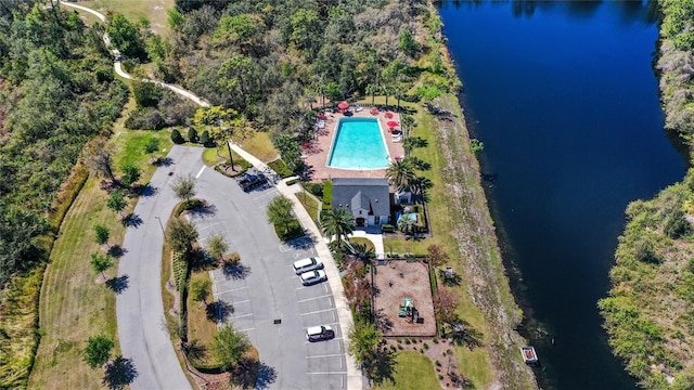 birds eye view of property featuring a water view