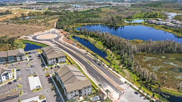 bird's eye view with a water view