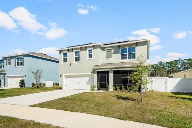 traditional home featuring solar panels, stucco siding, driveway, an attached garage, and a gate