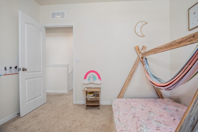 bedroom featuring carpet flooring, baseboards, and visible vents