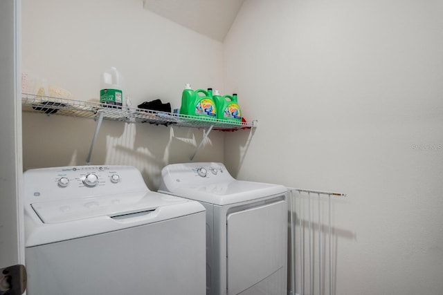 laundry room featuring independent washer and dryer and laundry area